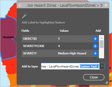 Attributes pop-up with new text layer name selected to edit
